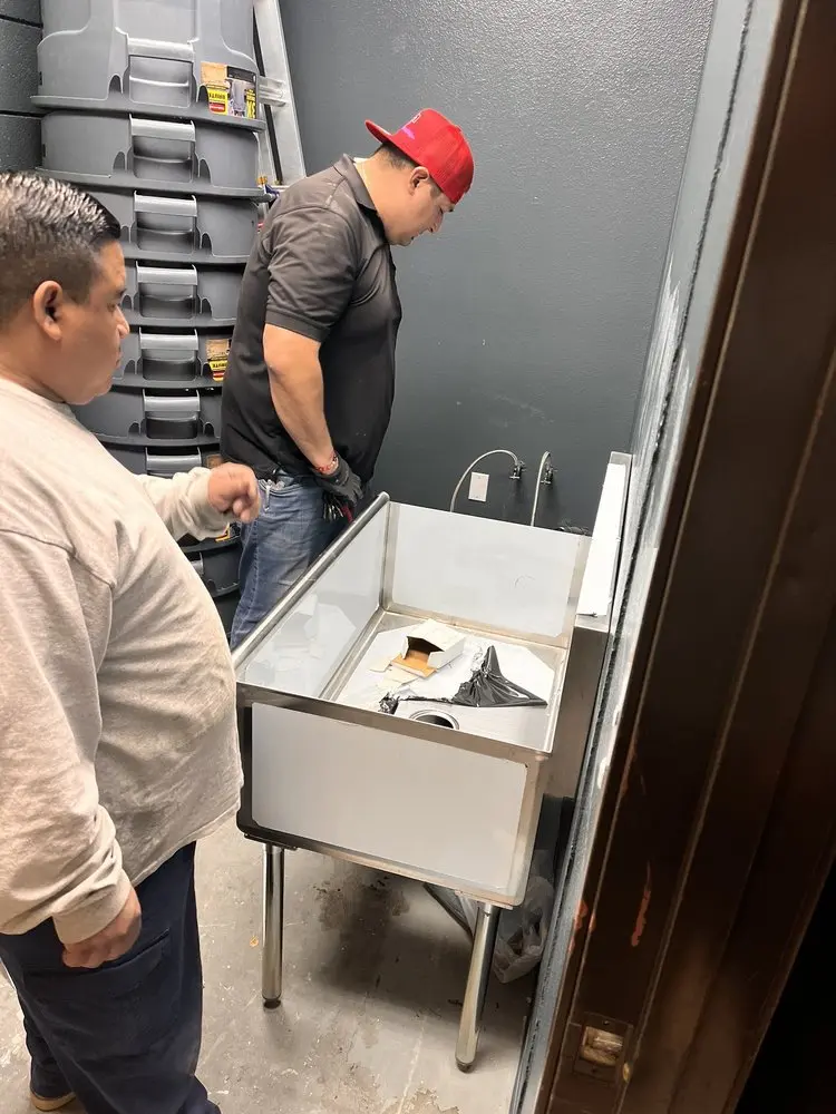 Commercial plumbing and sink installation in St. John